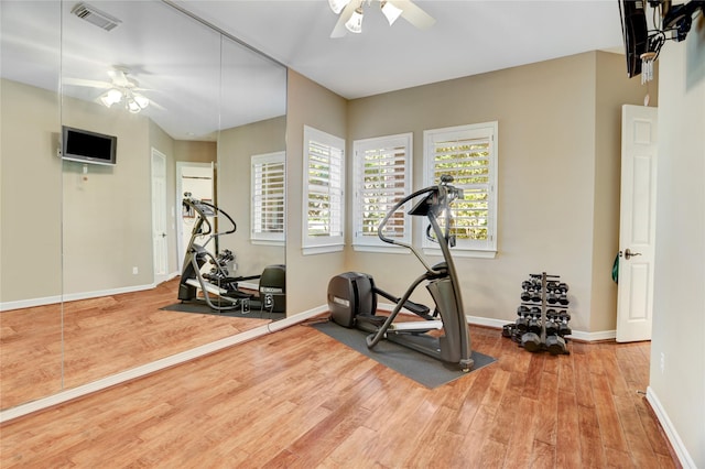 3207 Riviera Dr, Sugar Land, TX 77479 - exercise room with a ceiling fan and wood finished floors