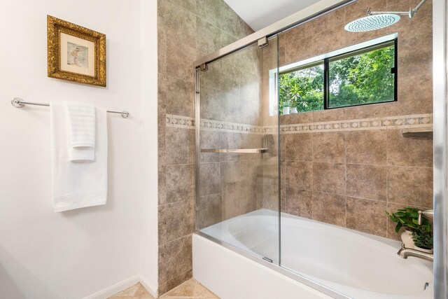 291 E Rainbow Ridge Cir, The Woodlands, TX 77381 - bathroom featuring shower / bath combination with glass door