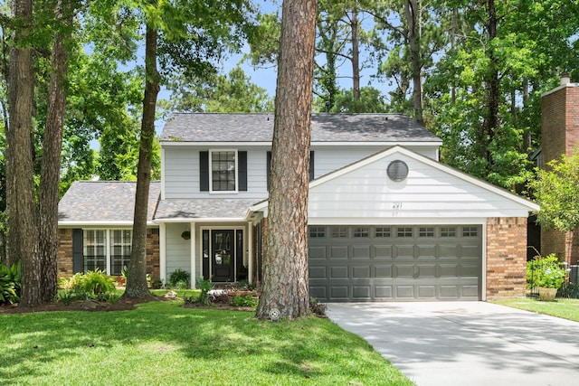 291 E Rainbow Ridge Cir, The Woodlands, TX 77381 - traditional-style home with driveway, a front lawn, a garage, and brick siding
