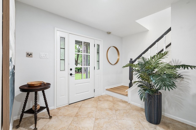 291 E Rainbow Ridge Cir, The Woodlands, TX 77381 - entryway with baseboards and stairs