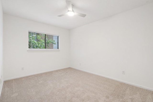 291 E Rainbow Ridge Cir, The Woodlands, TX 77381 - spare room featuring carpet flooring and ceiling fan