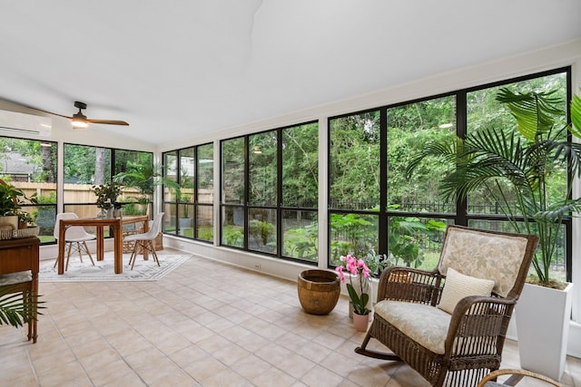 291 E Rainbow Ridge Cir, The Woodlands, TX 77381 - sunroom / solarium with a wall mounted AC, a ceiling fan, outdoor dining area, tile patterned flooring, and lofted ceiling