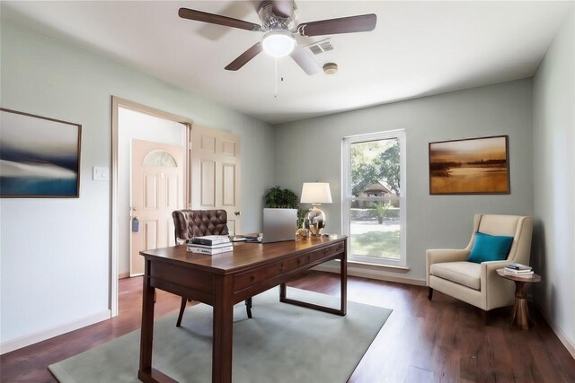 5402 Sheraton Oaks Dr, Houston, TX 77091 - home office with dark wood finished floors and ceiling fan