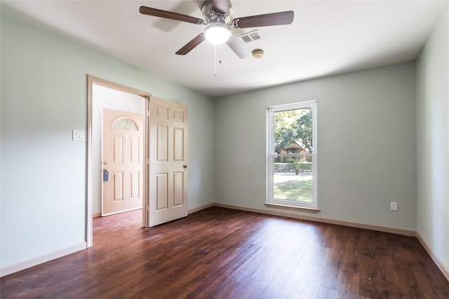 5402 Sheraton Oaks Dr, Houston, TX 77091 - unfurnished room with dark wood-style flooring and a ceiling fan