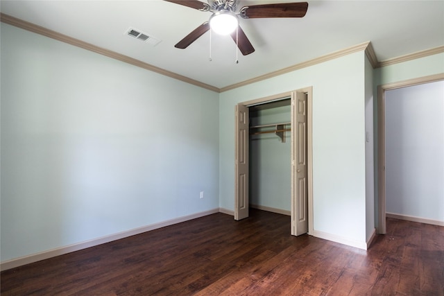 5402 Sheraton Oaks Dr, Houston, TX 77091 - unfurnished bedroom featuring dark wood-type flooring, crown molding, a closet, and a ceiling fan