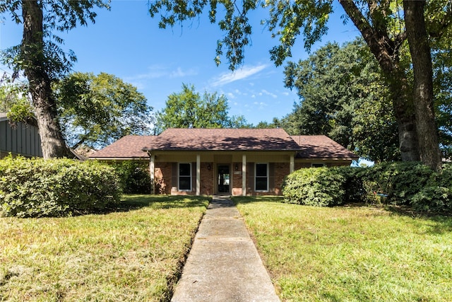 5402 Sheraton Oaks Dr, Houston, TX 77091 - view of front facade featuring a front lawn and brick siding