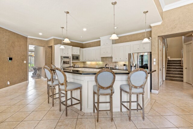 3602 Vashon Ln, Spring, TX 77388 - kitchen featuring appliances with stainless steel finishes, light tile patterned floors, decorative backsplash, dark countertops, and ornamental molding