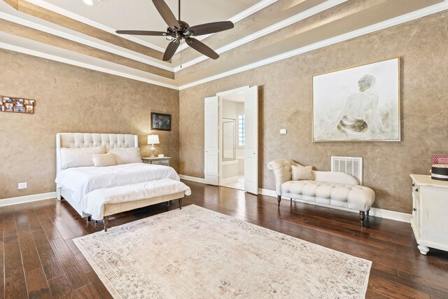 3602 Vashon Ln, Spring, TX 77388 - bedroom with crown molding, dark wood-style floors, connected bathroom, and a tray ceiling