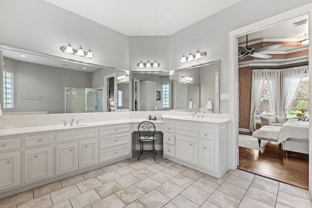 3602 Vashon Ln, Spring, TX 77388 - bathroom featuring double vanity, a ceiling fan, tile patterned flooring, and plenty of natural light
