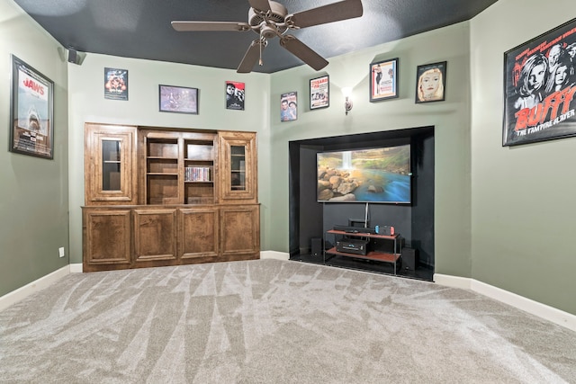 3602 Vashon Ln, Spring, TX 77388 - carpeted home theater room featuring a ceiling fan and baseboards