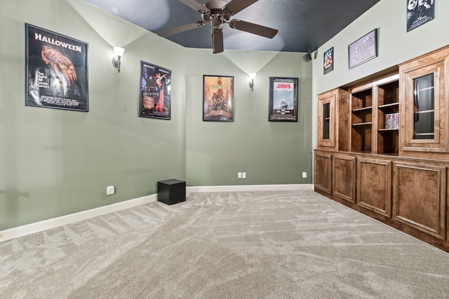 3602 Vashon Ln, Spring, TX 77388 - home theater room featuring a ceiling fan, carpet, and a textured ceiling