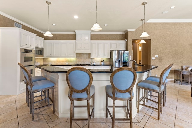3602 Vashon Ln, Spring, TX 77388 - kitchen with stainless steel appliances, dark countertops, white cabinets, decorative backsplash, and a kitchen bar
