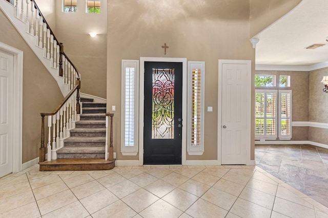 3602 Vashon Ln, Spring, TX 77388 - entrance foyer with stairway, a high ceiling, and crown molding