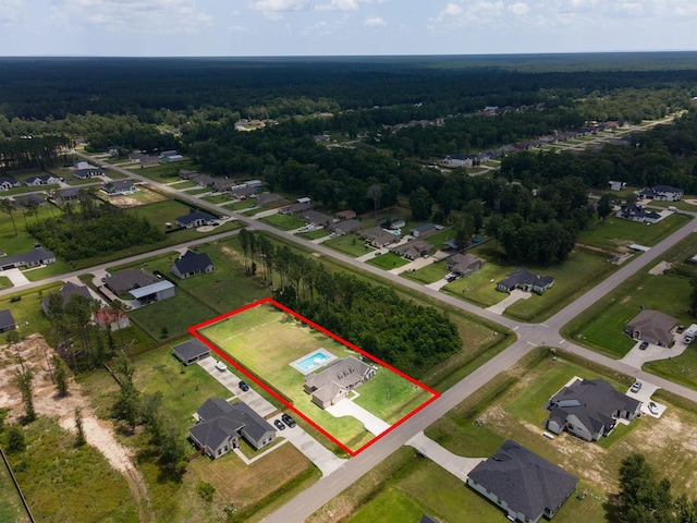 2018 Rd 660, Dayton, TX 77535 - aerial perspective of suburban area featuring property boundaries highlighted and a forest