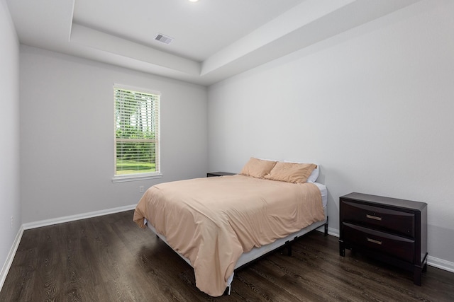 2018 Rd 660, Dayton, TX 77535 - bedroom with wood finished floors and a tray ceiling