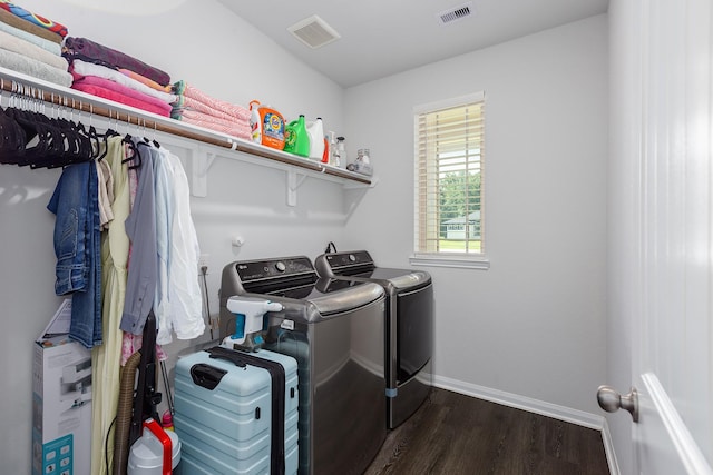 2018 Rd 660, Dayton, TX 77535 - laundry area with washer and clothes dryer and dark wood-style floors