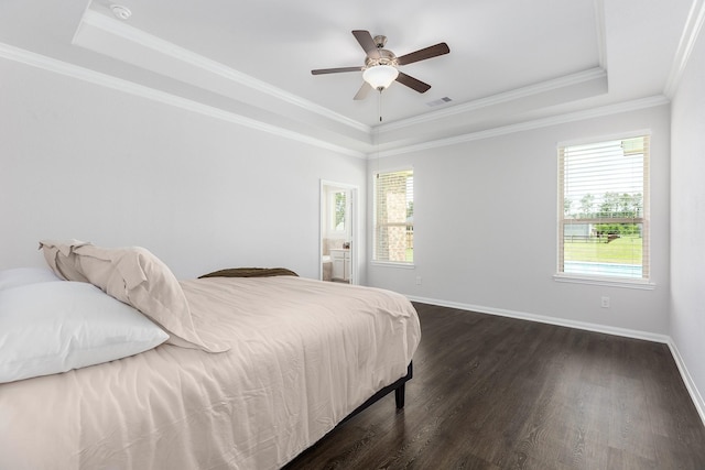 2018 Rd 660, Dayton, TX 77535 - bedroom with a tray ceiling, dark wood-style floors, crown molding, and ceiling fan