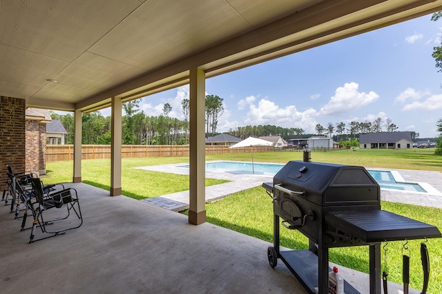 2018 Rd 660, Dayton, TX 77535 - fenced backyard featuring a patio and grilling area