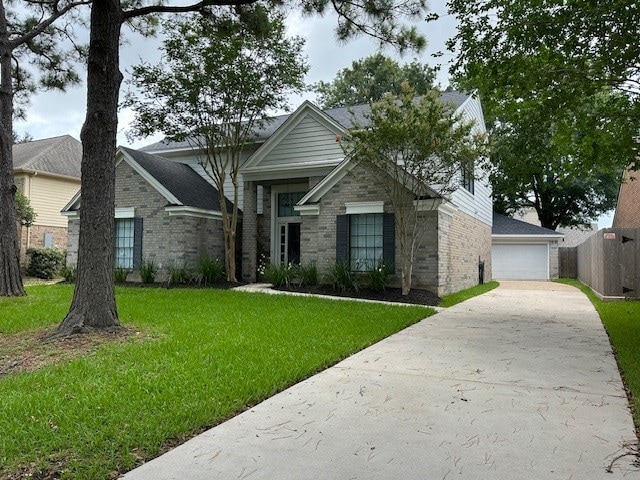 2102 Autumn Cove Dr, League City, TX 77573 - single story home featuring a garage and brick siding