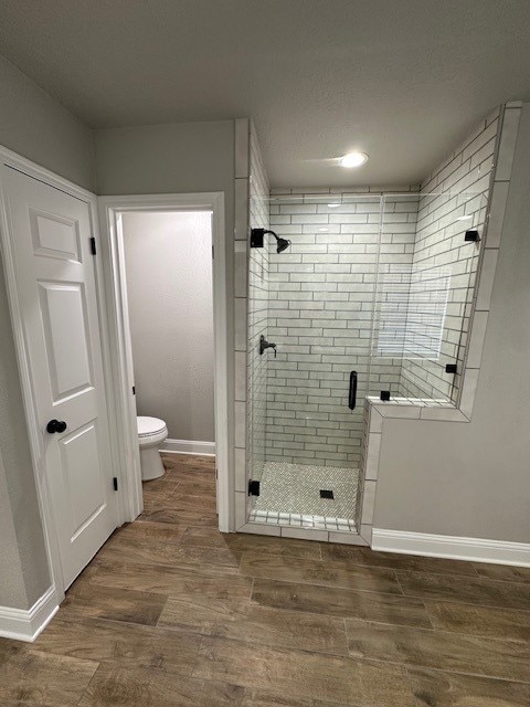 2102 Autumn Cove Dr, League City, TX 77573 - full bathroom with a shower stall and wood finished floors