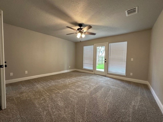 2102 Autumn Cove Dr, League City, TX 77573 - spare room with ceiling fan, carpet flooring, and a textured ceiling