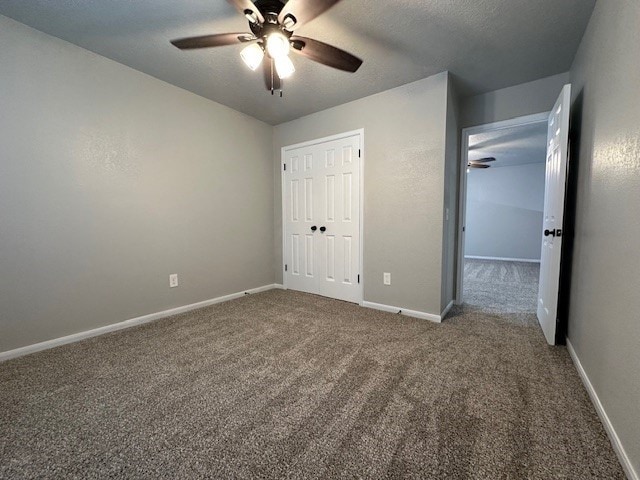 2102 Autumn Cove Dr, League City, TX 77573 - unfurnished bedroom with carpet floors, a closet, and ceiling fan