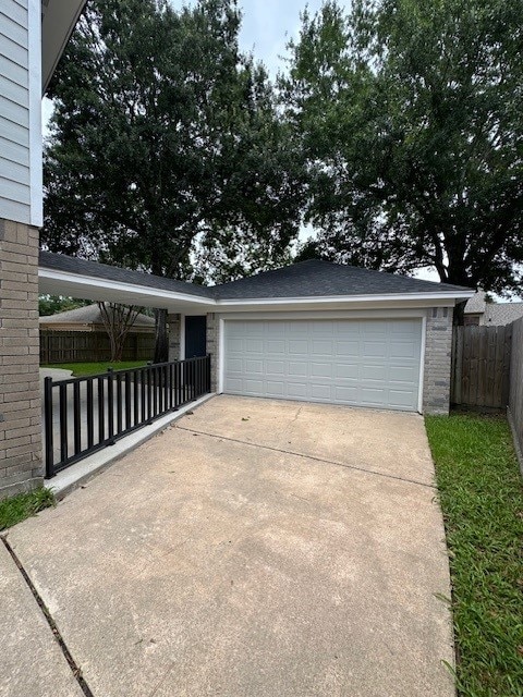 2102 Autumn Cove Dr, League City, TX 77573 - garage featuring driveway