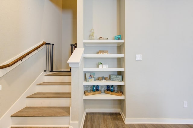 320 Parker Willow Ln, Houston, TX 77076 - staircase featuring wood finished floors