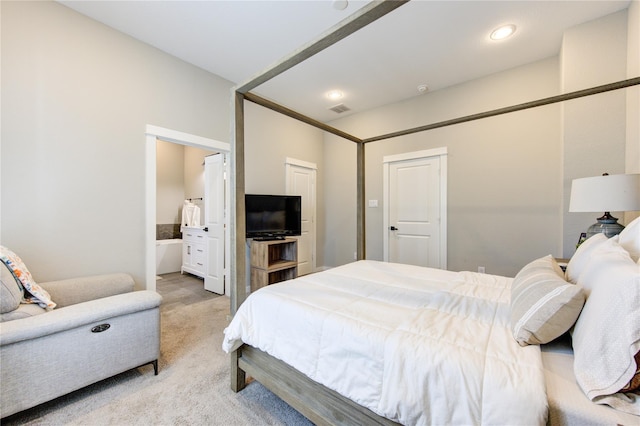 320 Parker Willow Ln, Houston, TX 77076 - bedroom with light colored carpet and ensuite bathroom