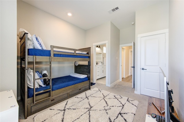 320 Parker Willow Ln, Houston, TX 77076 - carpeted bedroom with baseboards and ensuite bath