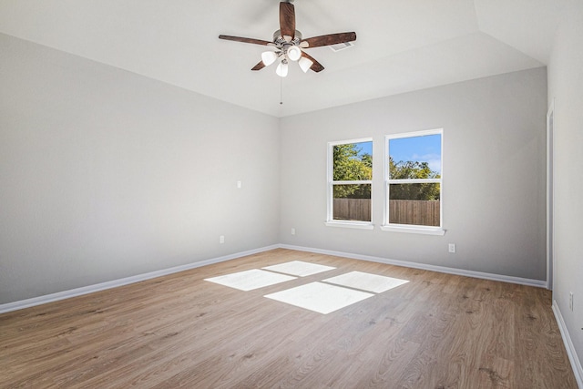 12359 Pecan Dr, Willis, TX 77318 - empty room featuring a ceiling fan and light wood-style flooring