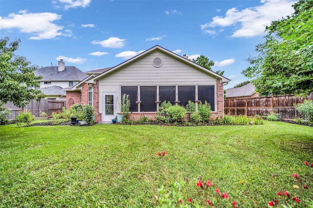5531 Cherish Trl, Katy, TX 77494 - rear view of property with brick siding and a fenced backyard