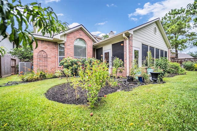 5531 Cherish Trl, Katy, TX 77494 - view of front of home with brick siding and a chimney