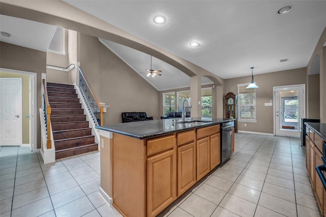 5531 Cherish Trl, Katy, TX 77494 - kitchen featuring dishwashing machine, vaulted ceiling, ceiling fan, arched walkways, and healthy amount of natural light