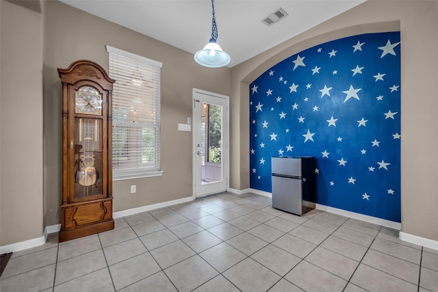 5531 Cherish Trl, Katy, TX 77494 - entryway with light tile patterned floors and baseboards