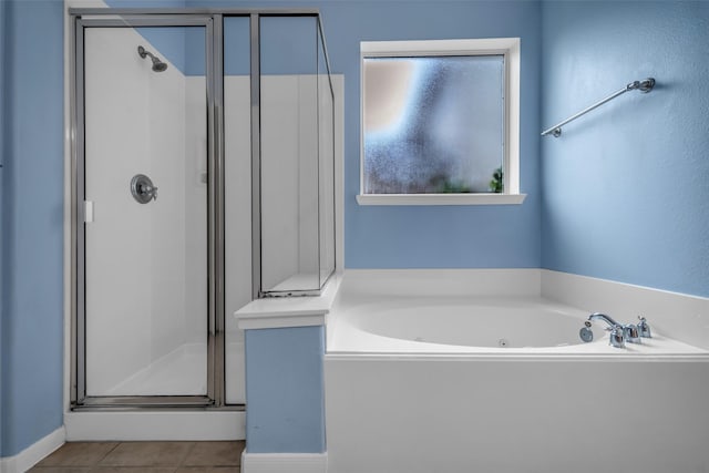 5531 Cherish Trl, Katy, TX 77494 - bathroom with a stall shower, a jetted tub, and tile patterned flooring