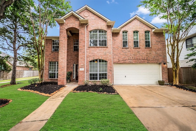 5531 Cherish Trl, Katy, TX 77494 - traditional-style house with driveway, an attached garage, and brick siding