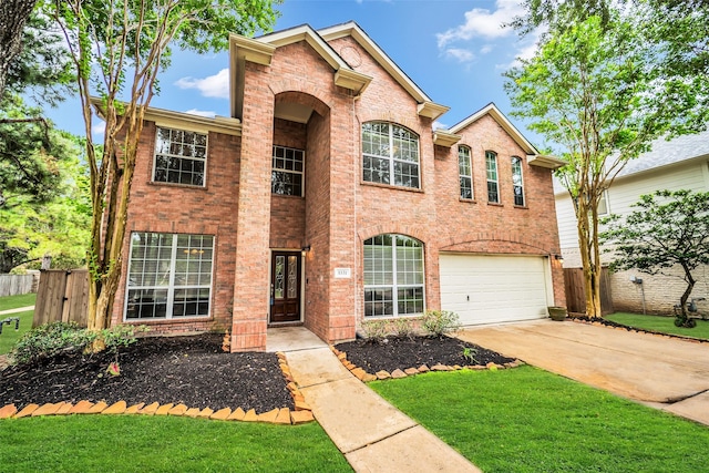 5531 Cherish Trl, Katy, TX 77494 - traditional home featuring driveway, brick siding, and a garage