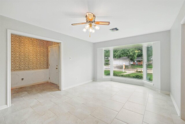 7826 Braesview Ln, Houston, TX 77071 - spare room with ceiling fan and baseboards