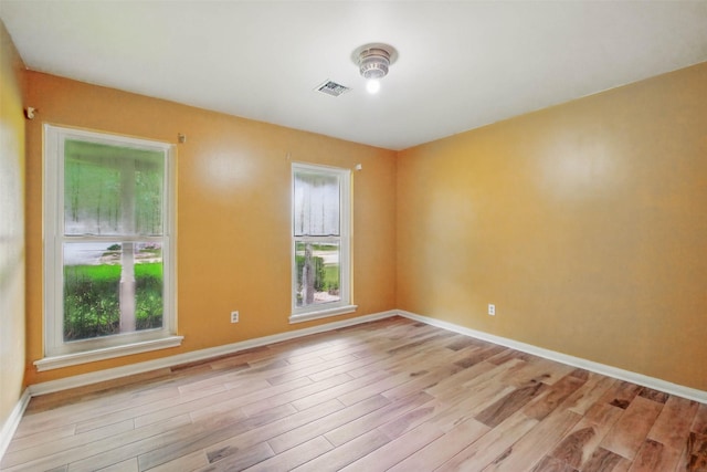 7826 Braesview Ln, Houston, TX 77071 - empty room with light wood-style floors and baseboards