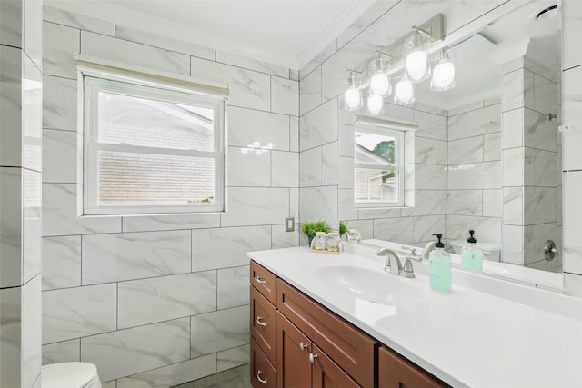 7826 Braesview Ln, Houston, TX 77071 - bathroom featuring tile walls, crown molding, and vanity
