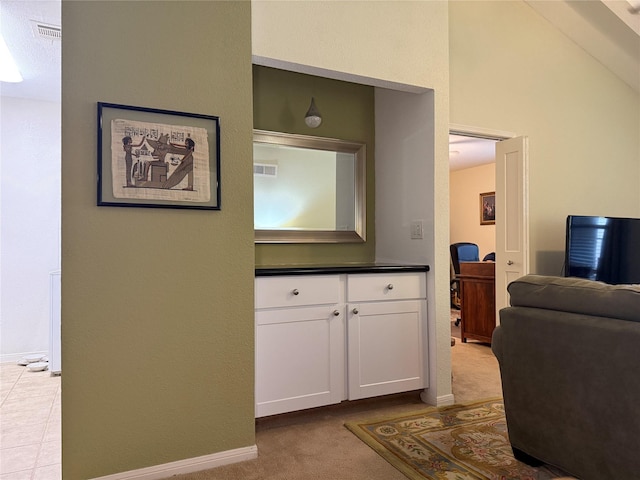 5711 Sugar Hill Dr Unit 46, Houston, TX 77057 - hallway with baseboards and carpet floors