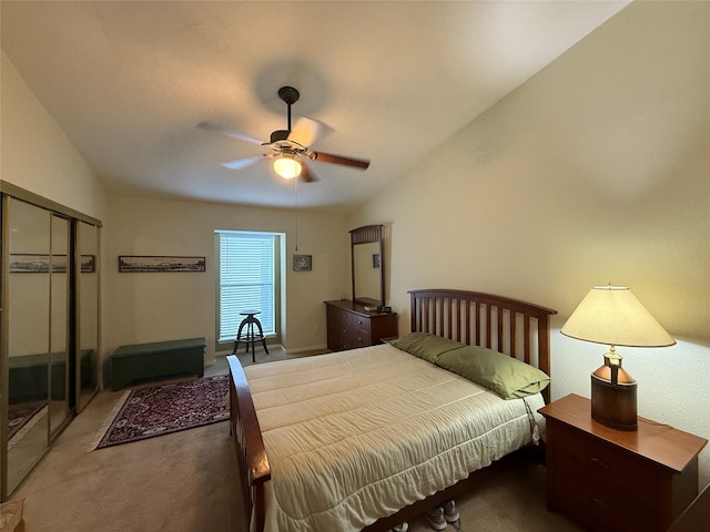 5711 Sugar Hill Dr Unit 46, Houston, TX 77057 - bedroom featuring carpet flooring, lofted ceiling, a closet, and a ceiling fan