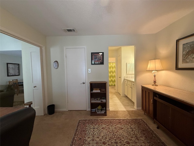 5711 Sugar Hill Dr Unit 46, Houston, TX 77057 - hallway with light colored carpet