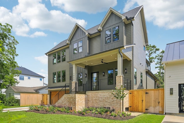 1023 Grovewood Ln, Houston, TX 77008 - craftsman inspired home featuring board and batten siding, a gate, brick siding, and roof with shingles