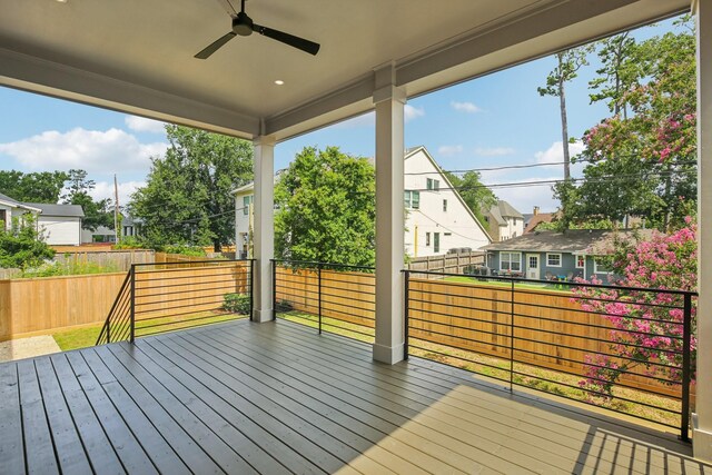 1023 Grovewood Ln, Houston, TX 77008 - wooden deck with a ceiling fan, a fenced backyard, and a residential view