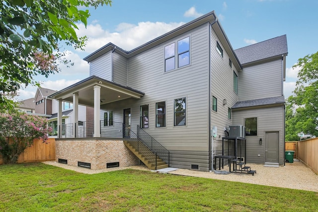 1023 Grovewood Ln, Houston, TX 77008 - back of property with a fenced backyard, a porch, stairs, and crawl space