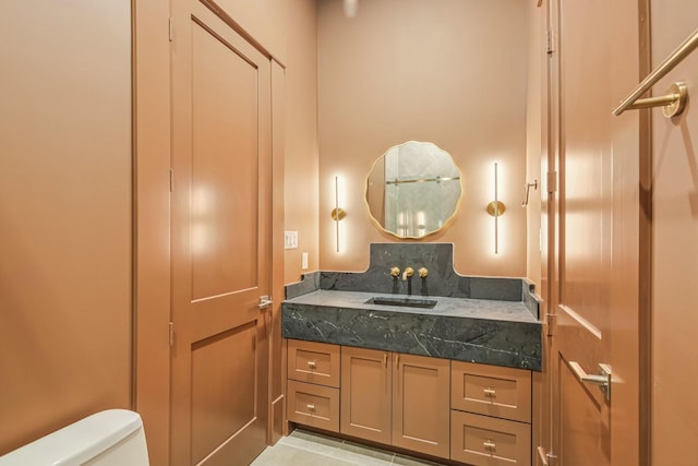 1023 Grovewood Ln, Houston, TX 77008 - half bath with vanity and tile patterned floors