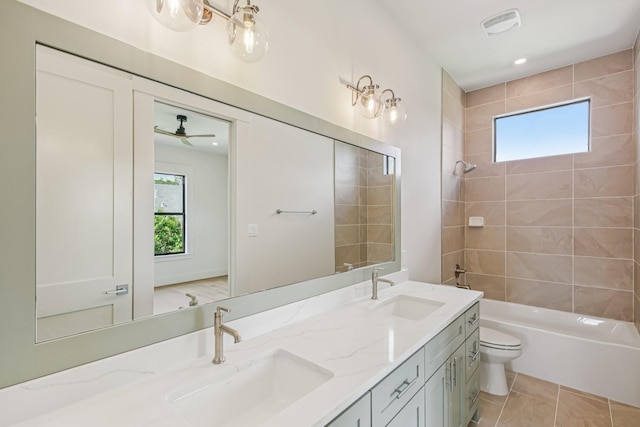 1023 Grovewood Ln, Houston, TX 77008 - bathroom featuring double vanity, ceiling fan, bathing tub / shower combination, and recessed lighting