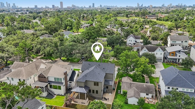 1023 Grovewood Ln, Houston, TX 77008 - aerial perspective of suburban area featuring city skyline